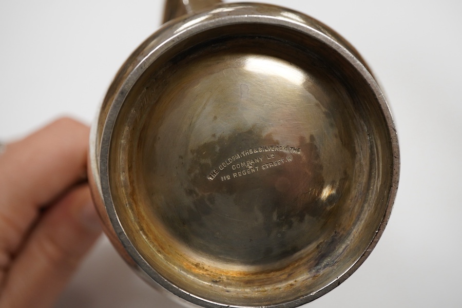 A George V silver café au lait pair, by Goldsmiths & Silversmiths Co Ltd, London, 1922, height 16.5cmm gross weight 20.3oz.